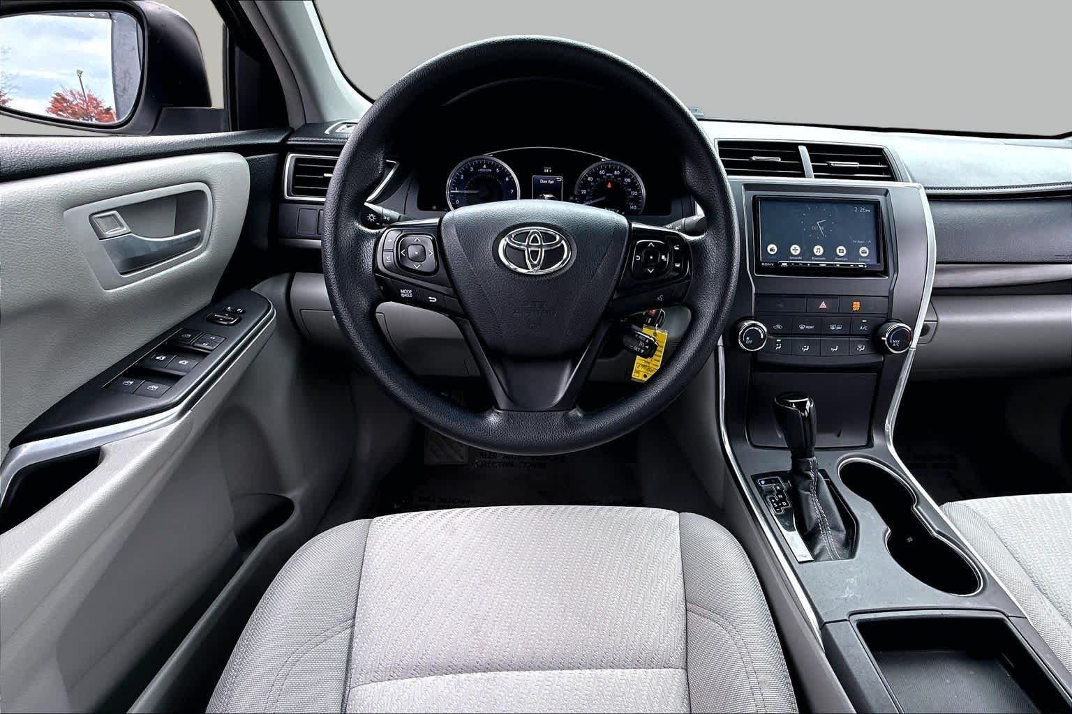 Used 2016 Super White Toyota LE image 6