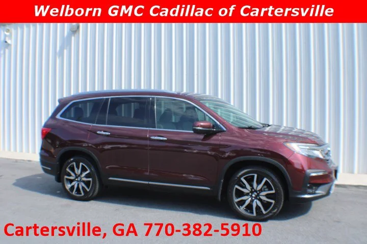 Used 2020 Red Honda AWD Touring 7 Passenger image 1