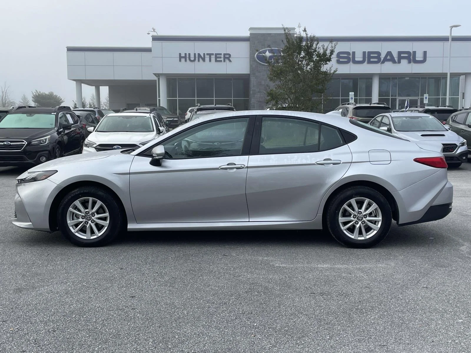 Used 2025 Celestial Silver Metallic Toyota LE image 25