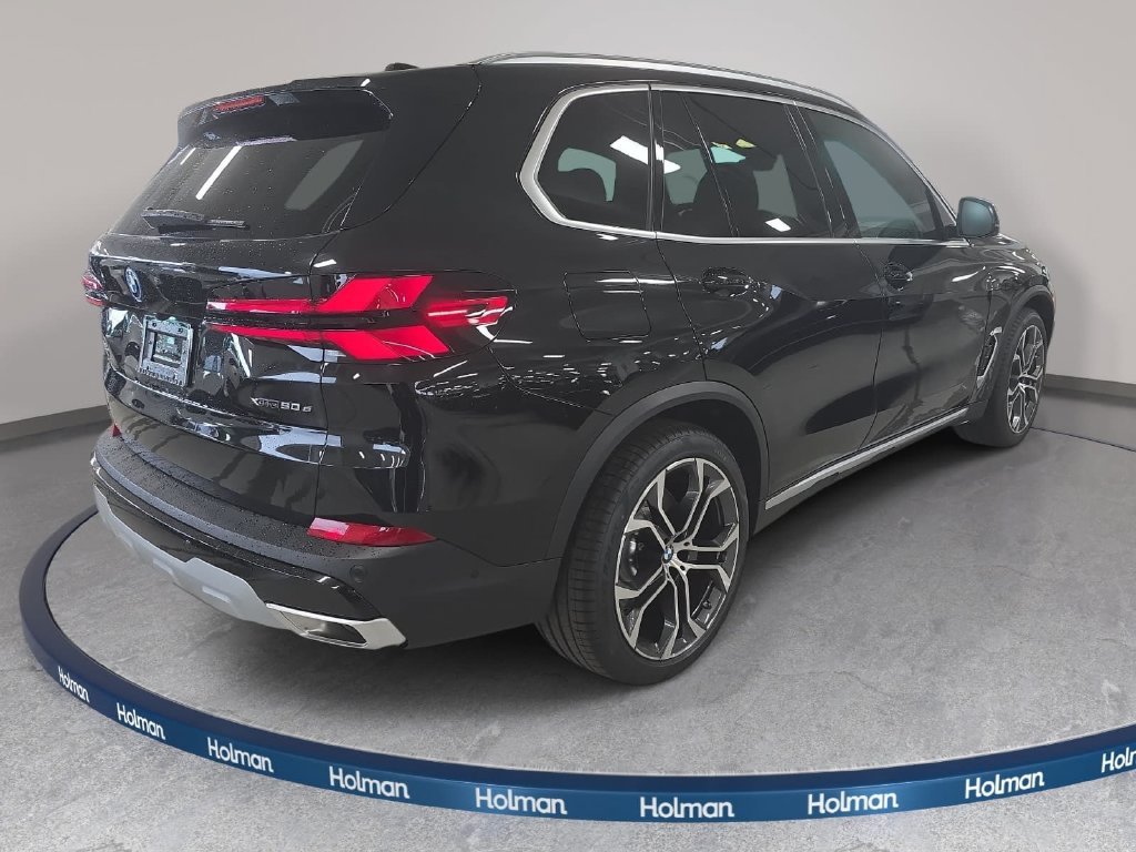New 2026 Black Sapphire Metallic BMW xDrive50e image 4