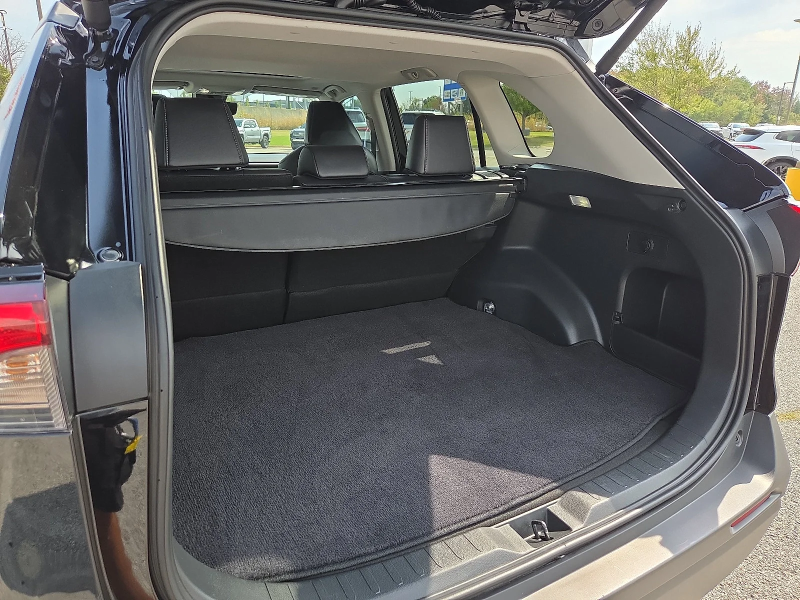 Used 2024 Midnight Black Metallic Toyota XLE Premium image 9