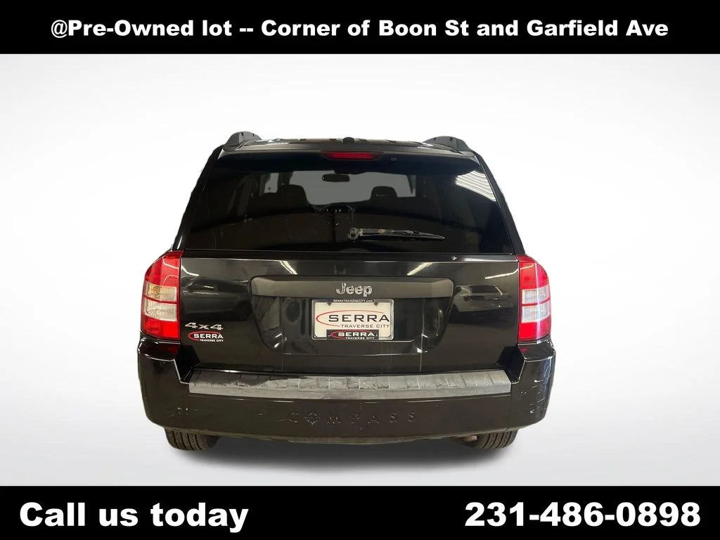 Used 2009 Black Jeep Sport image 4