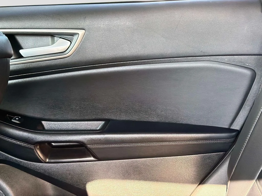 Used 2024 Agate Black Metallic Ford SEL image 16