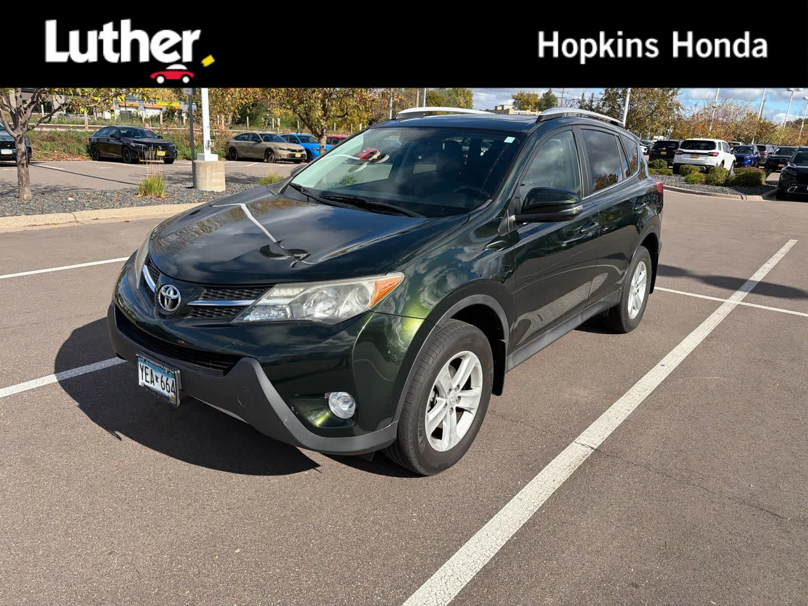 Used 2013 Spruce Mica Toyota XLE image 1
