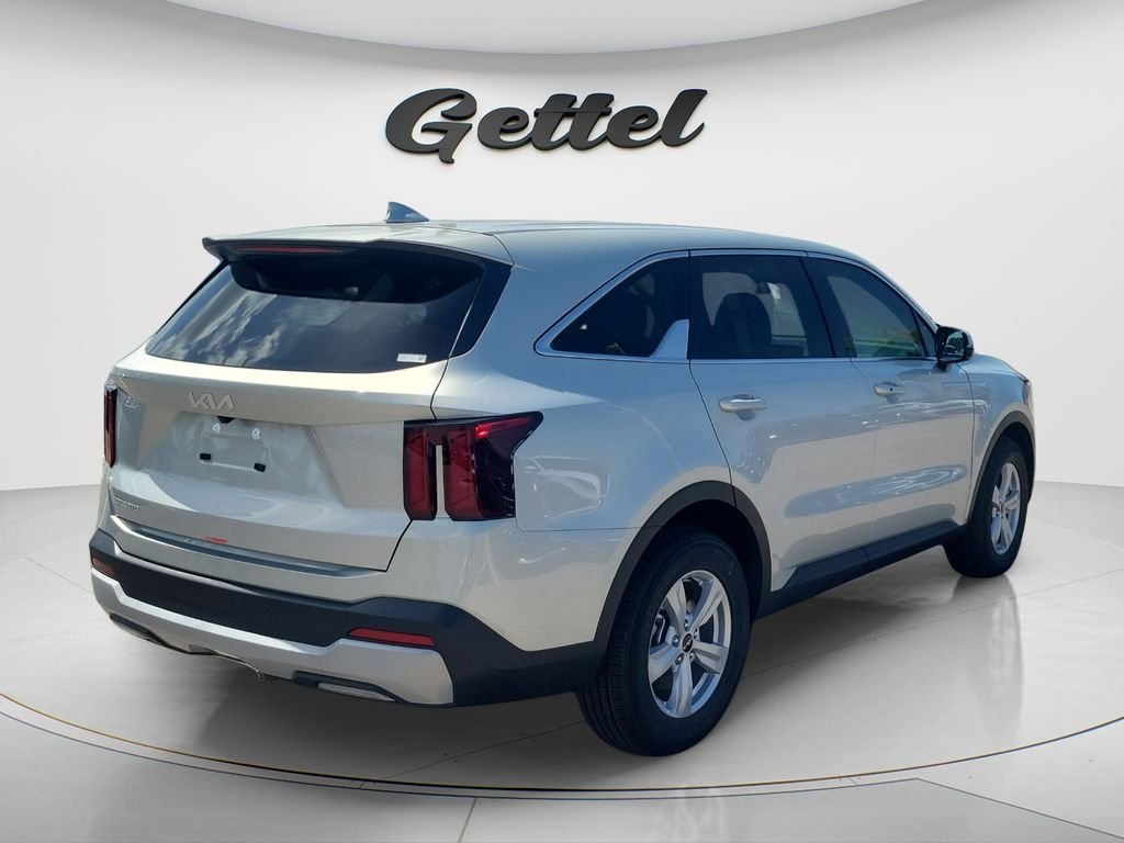 New 2026 Ivory Silver Kia LX image 5