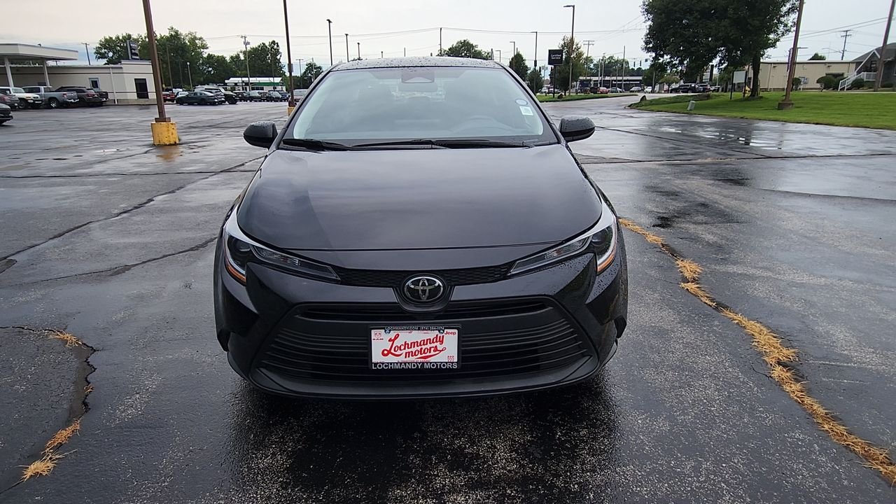Used 2025 Midnight Black Metallic Toyota LE image 3