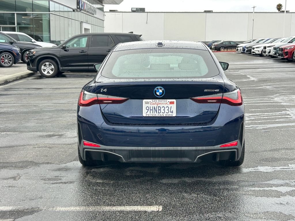 Certified Used 2023 Tanzanite Blue II Metallic BMW eDrive40 image 4