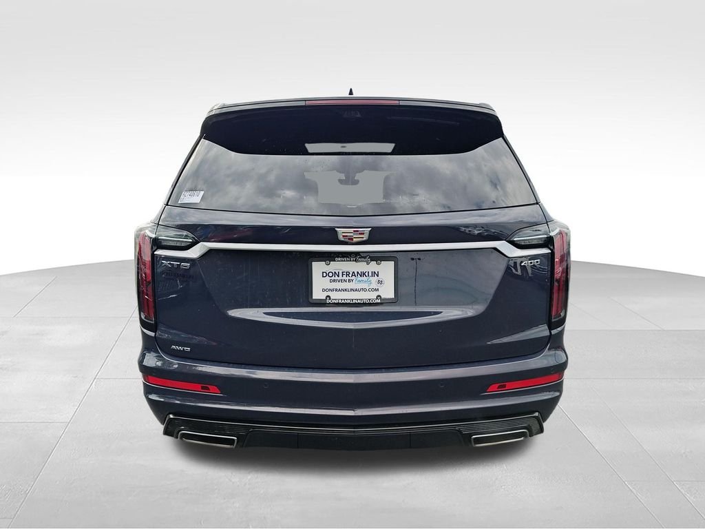 Used 2024 Blue Cadillac Sport image 4
