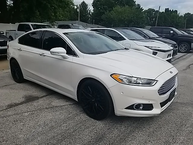 Used 2013 White Ford Titanium image 1