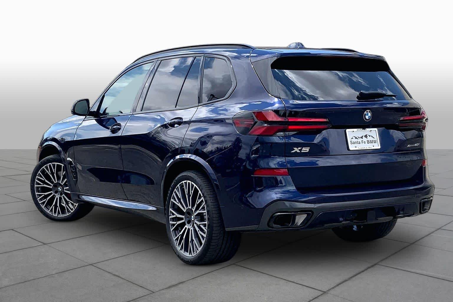 Used 2024 Tanzanite Blue II Metallic BMW xDrive40i image 11