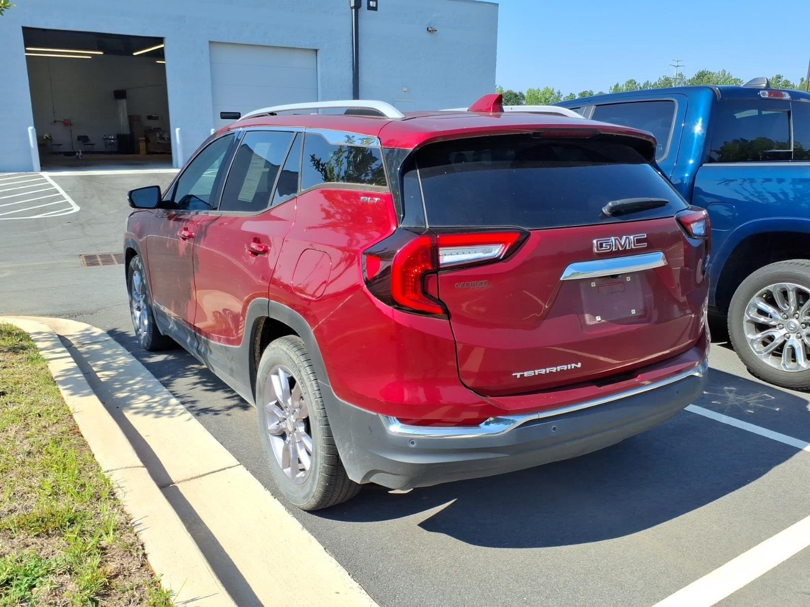 Used 2023 Volcanic Red Tintcoat GMC SLT image 12