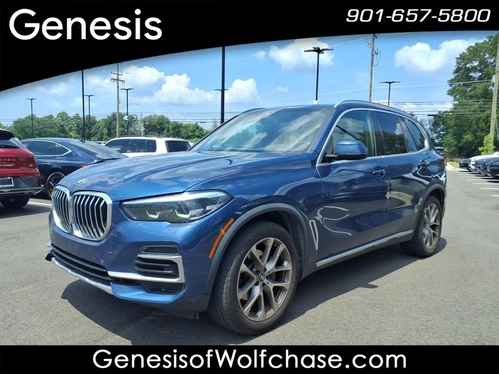 Used 2022 Blue BMW sDrive40i image 1