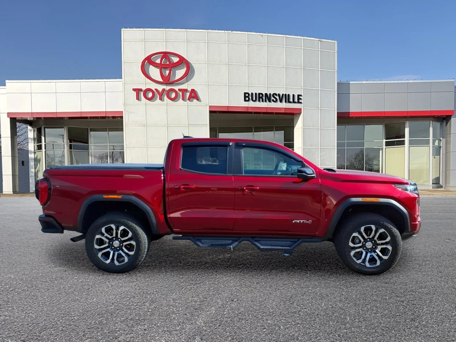 Used 2024 GMC Canyon AT4 with VIN 1GTP6DEKXR1256961 for sale in Burnsville, Minnesota