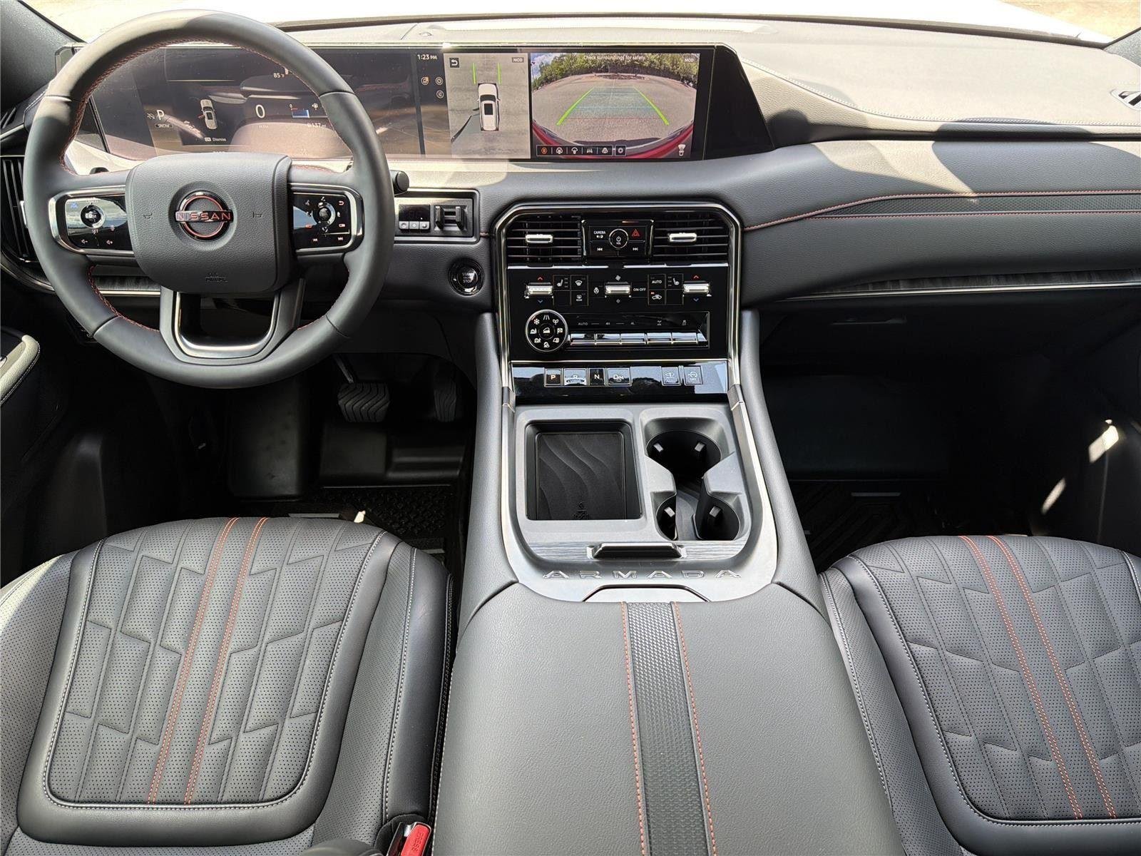 Used 2025 Aspen White Tricoat/Super Black Nissan PRO-4X image 9