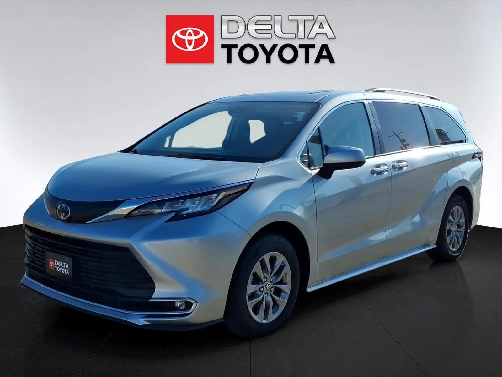 Used 2023 Celestial Silver Metallic Toyota XLE 7-Passenger image 1