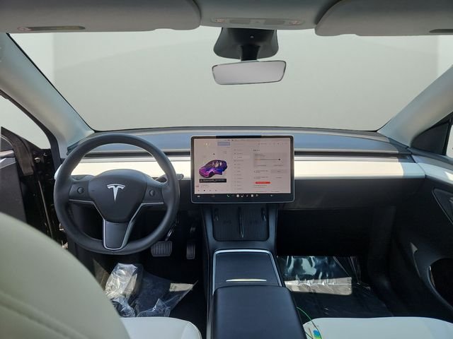 Used 2023 Tesla Model Y Long Range with VIN 7SAYGDEE9PF855742 for sale in Raynham, MA