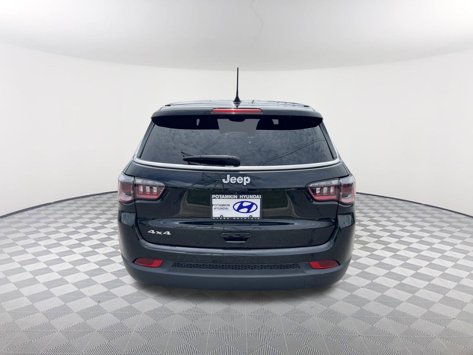 Used 2023 Diamond Black Crystal Pearlcoat Jeep Sport image 6