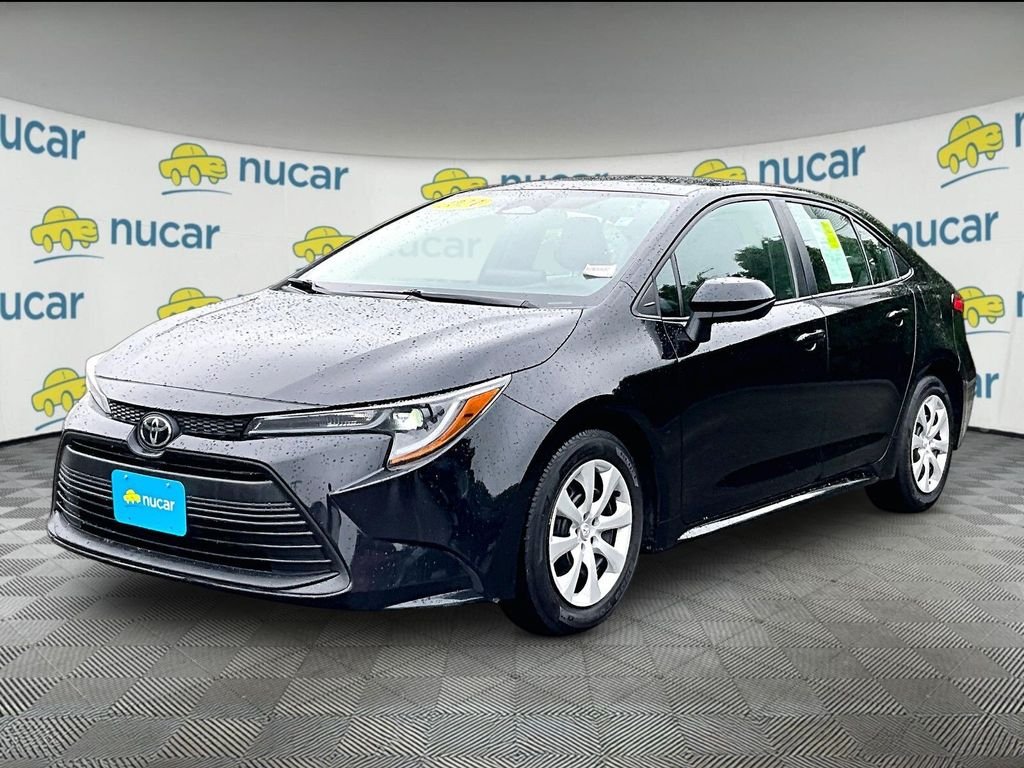 Used 2024 Black Toyota LE image 3