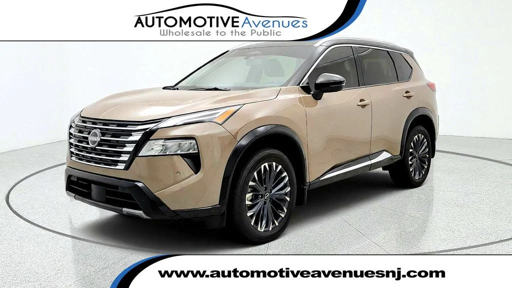 Used 2025 Baja Storm Metallic/Super Black Nissan AWD Platinum w/ ProPILOT Assist 2.1 & Head-Up Display image 1