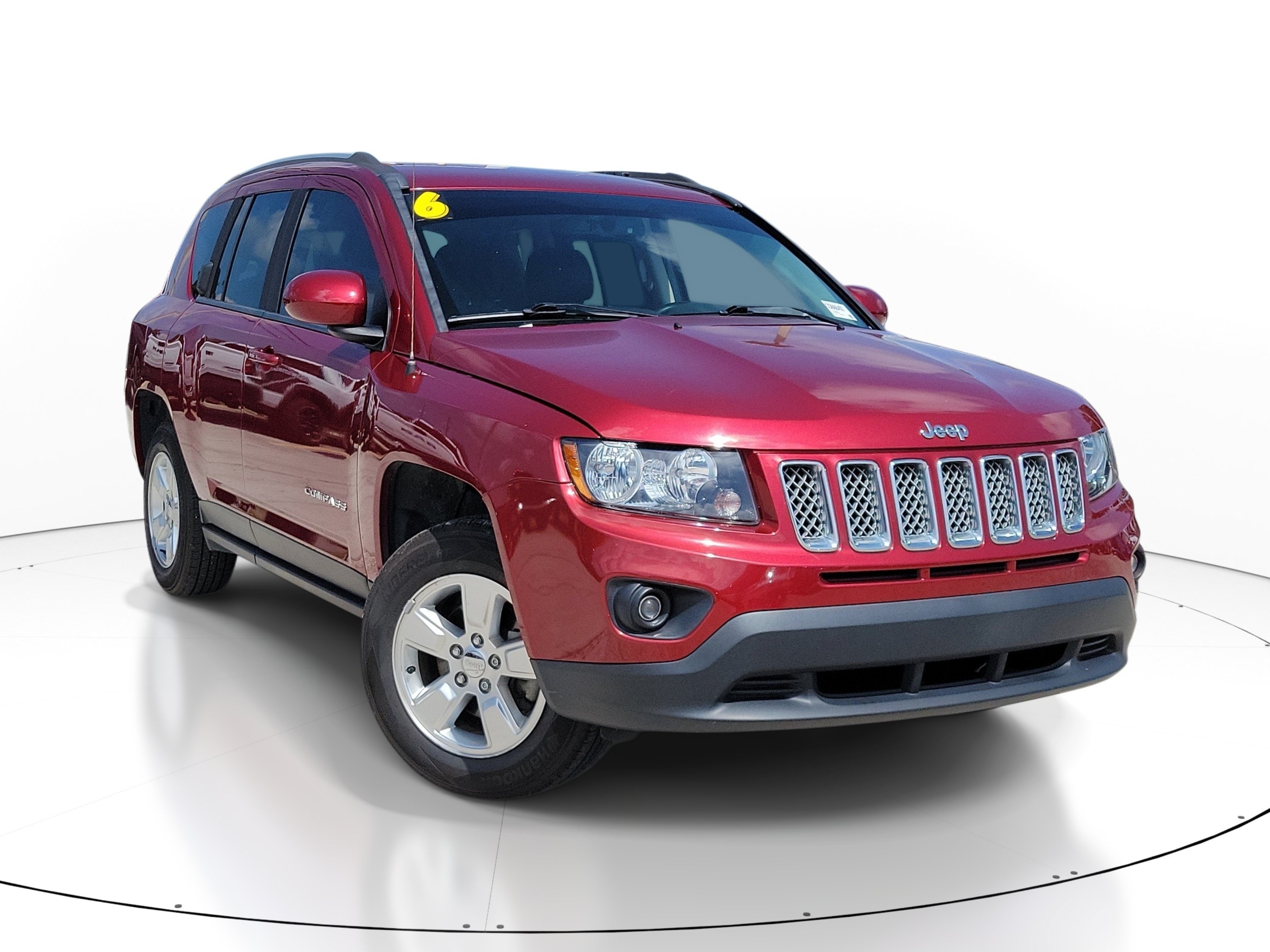 Used 2016 Deep Cherry Red Crystal Pearlcoat Jeep Latitude image 1