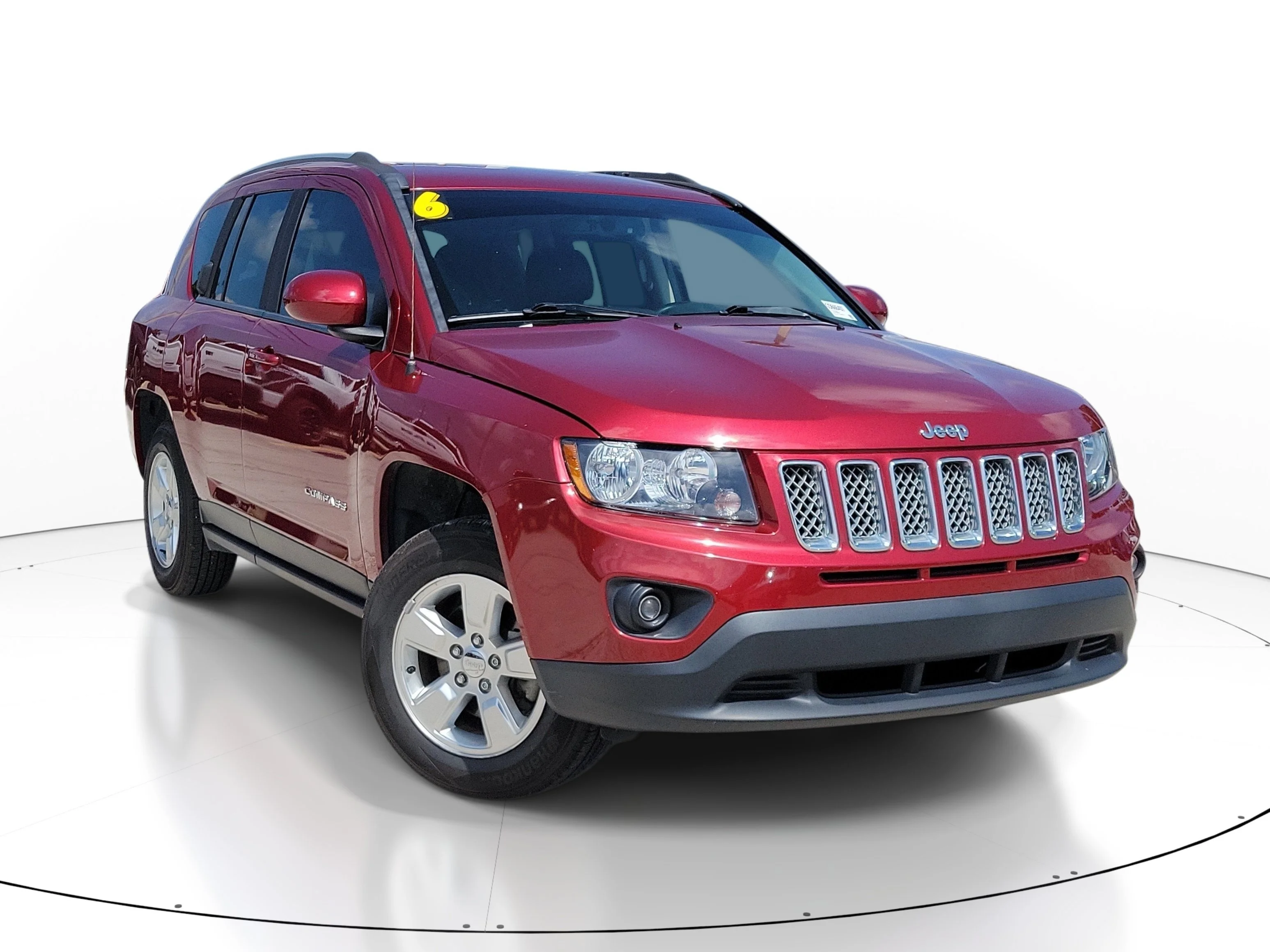 Used 2016 Deep Cherry Red Crystal Pearlcoat Jeep Latitude image 1