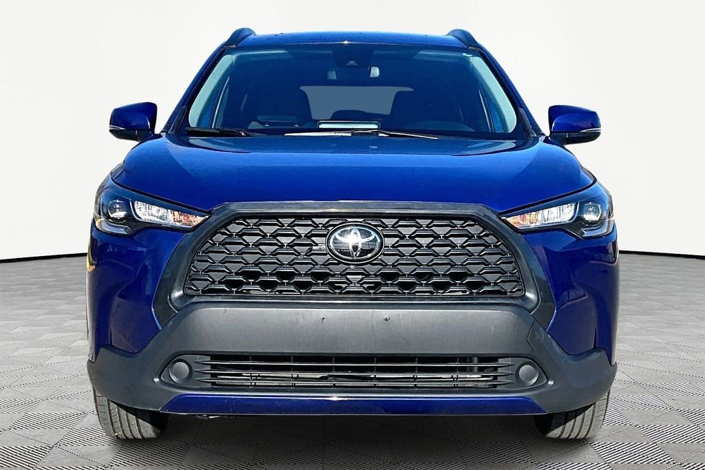 Certified 2022 Toyota Corolla Cross LE with VIN 7MUCAAAG7NV034877 for sale in Kansas City