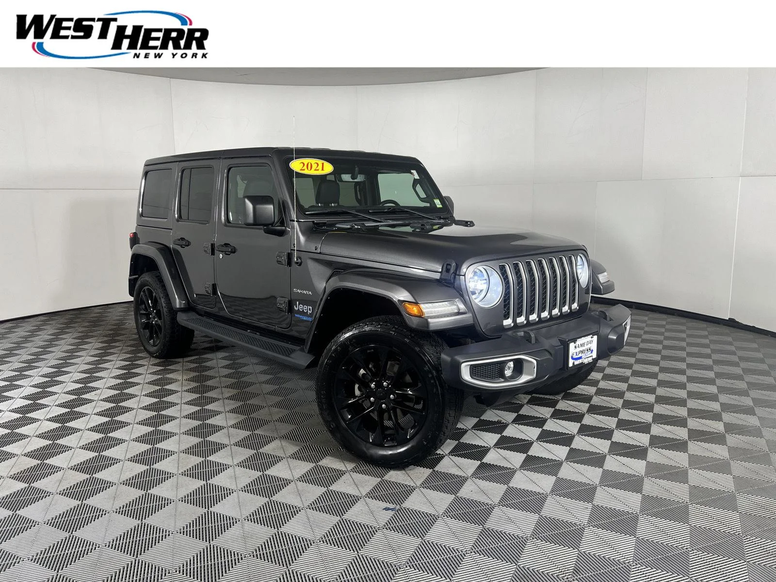 Used 2021 Granite Crystal Metallic Clearcoat Jeep Unlimited Sahara image 1