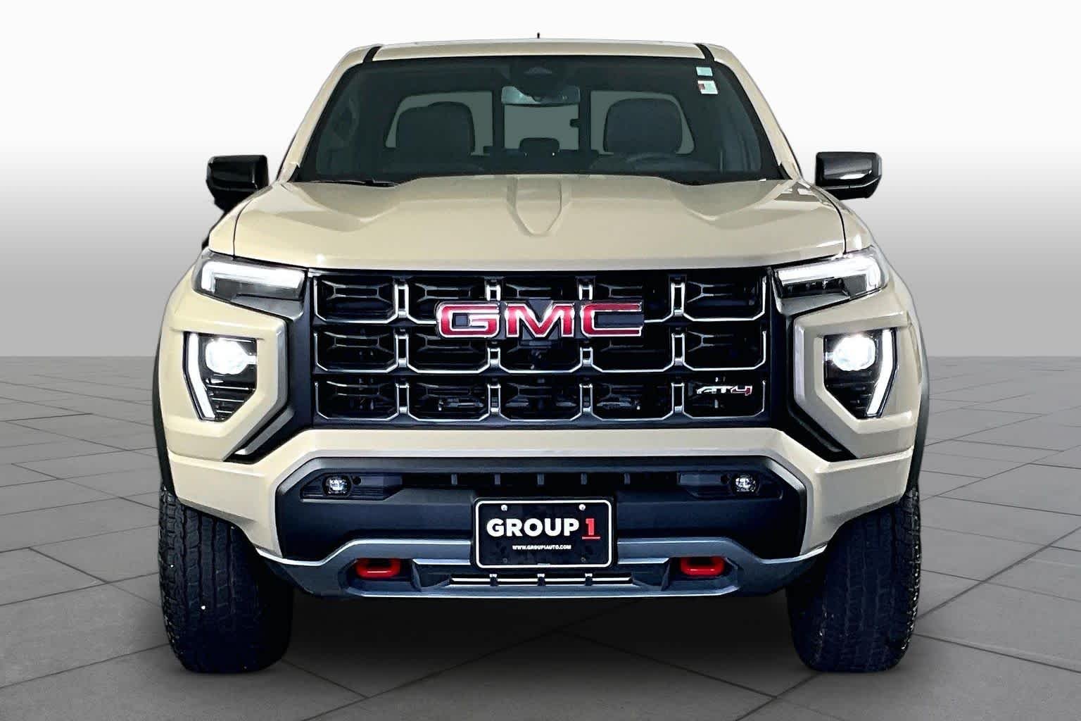 Used 2024 Desert Sand Metallic GMC 4WD AT4 image 4
