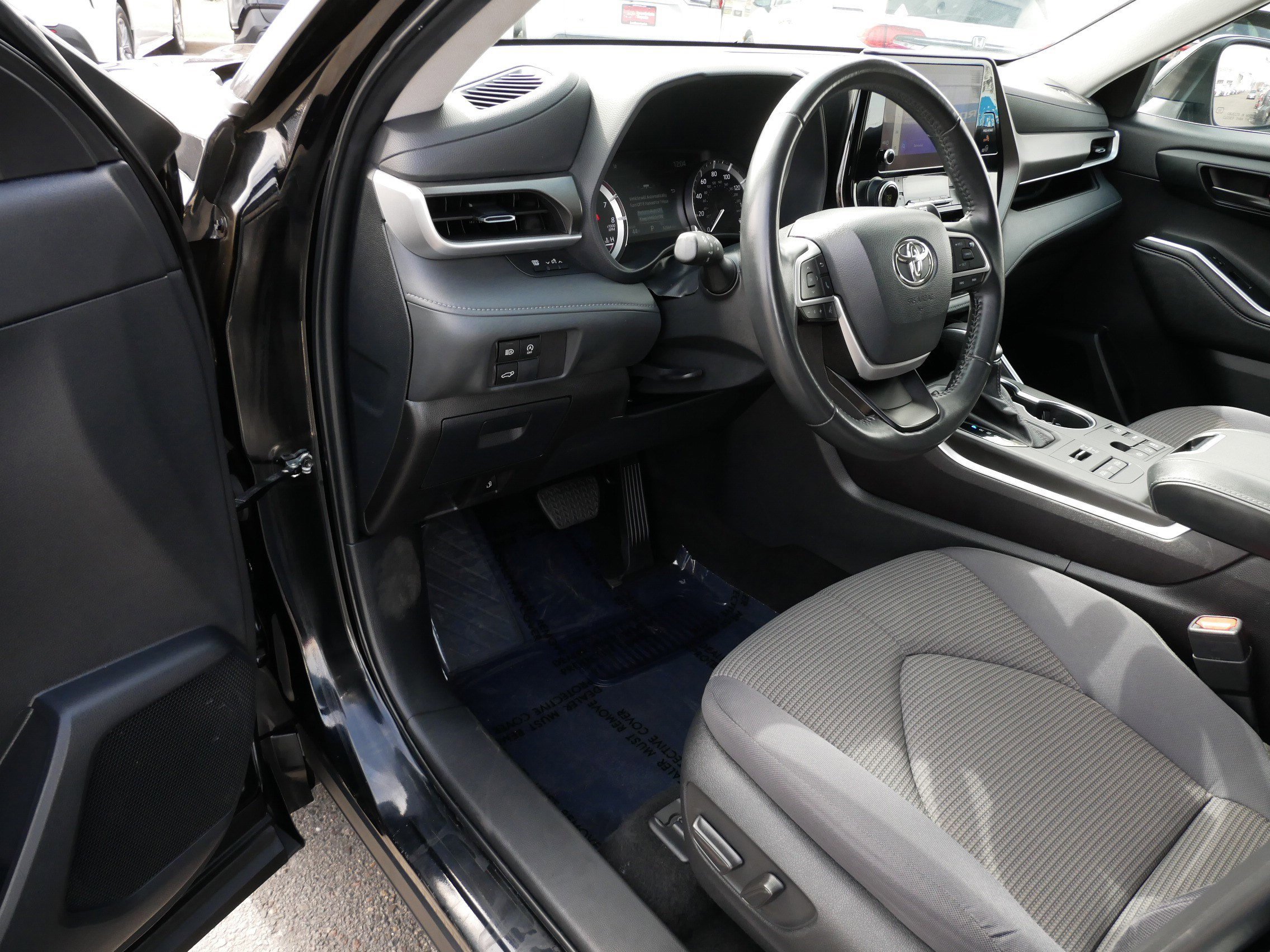 Certified 2024 Toyota Highlander LE with VIN 5TDKDRBHXRS538932 for sale in Brooklyn Center, Minnesota