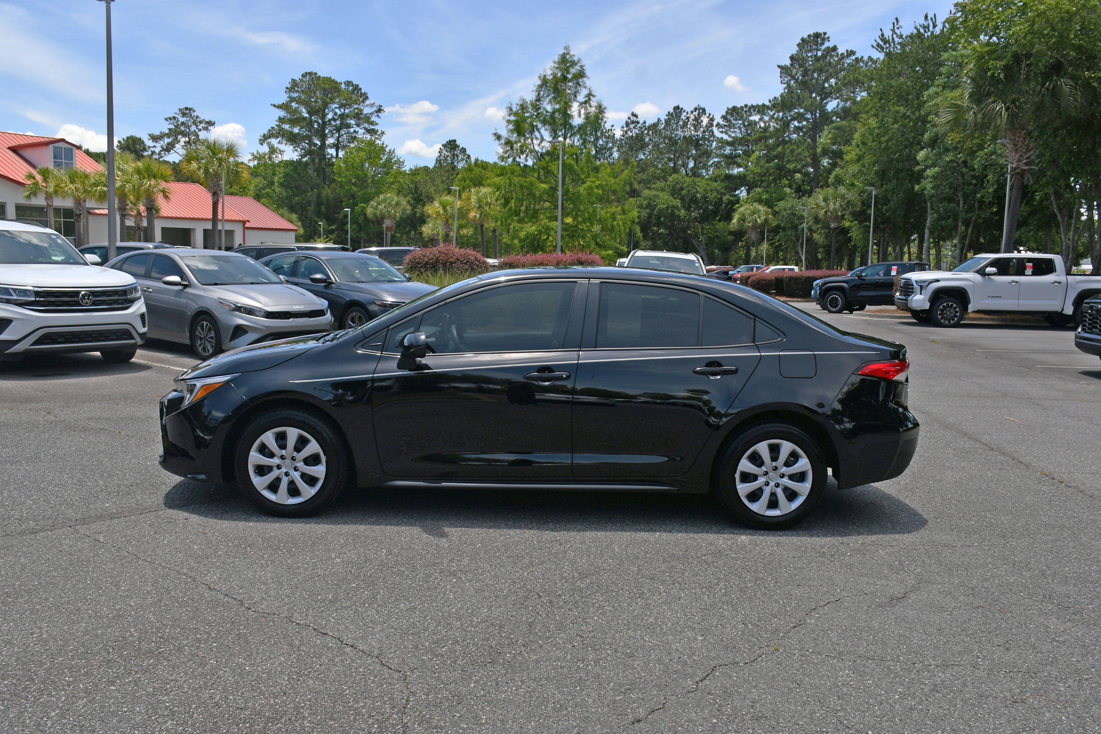 Used 2025 Black Toyota LE image 1