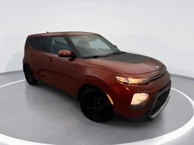 Used 2021 Orange Kia LX image 1