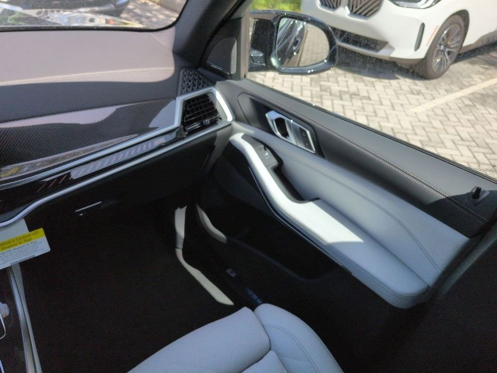 New 2026 Black Sapphire Metallic BMW M60i image 17