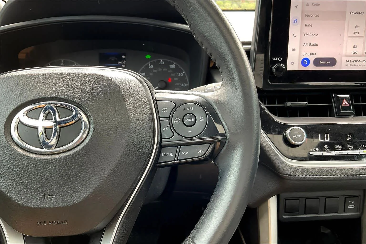 Used 2024 Acidic Blast/Jet Black Toyota Hybrid SE image 25