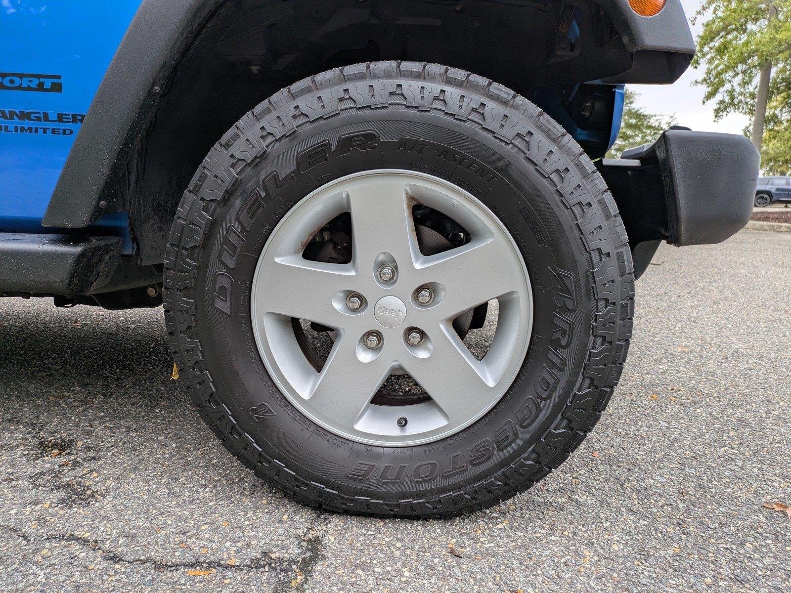 Used 2015 Hydro Blue Pearl Coat Jeep Sport image 11