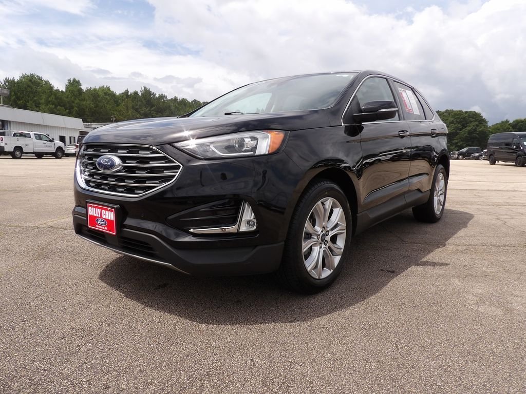 Used 2022 Black Metallic Ford Titanium image 4