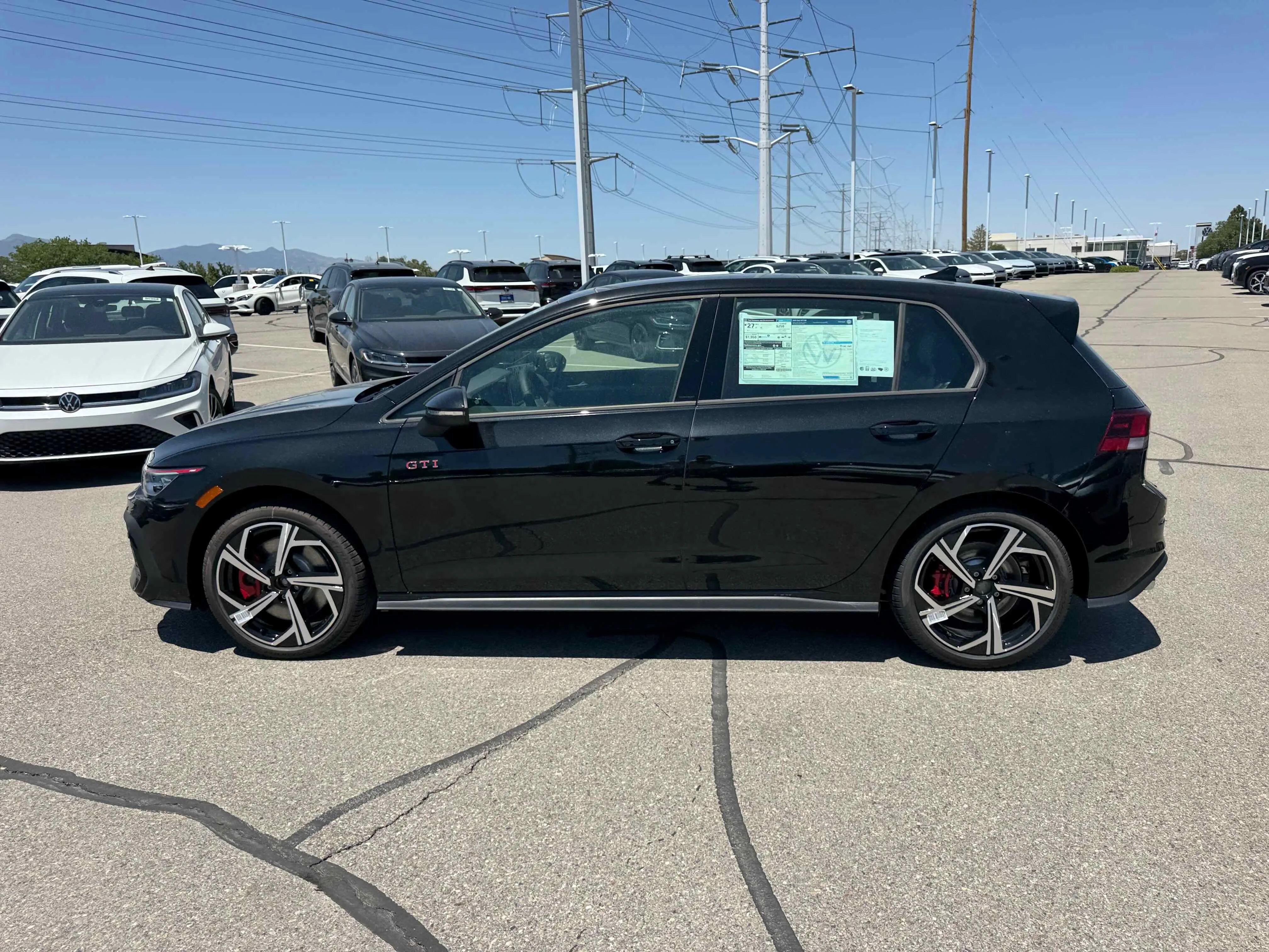 New 2025 Black Volkswagen SE image 2