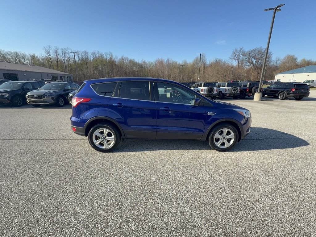 Used 2016 Deep Impact Blue Ford SE image 5