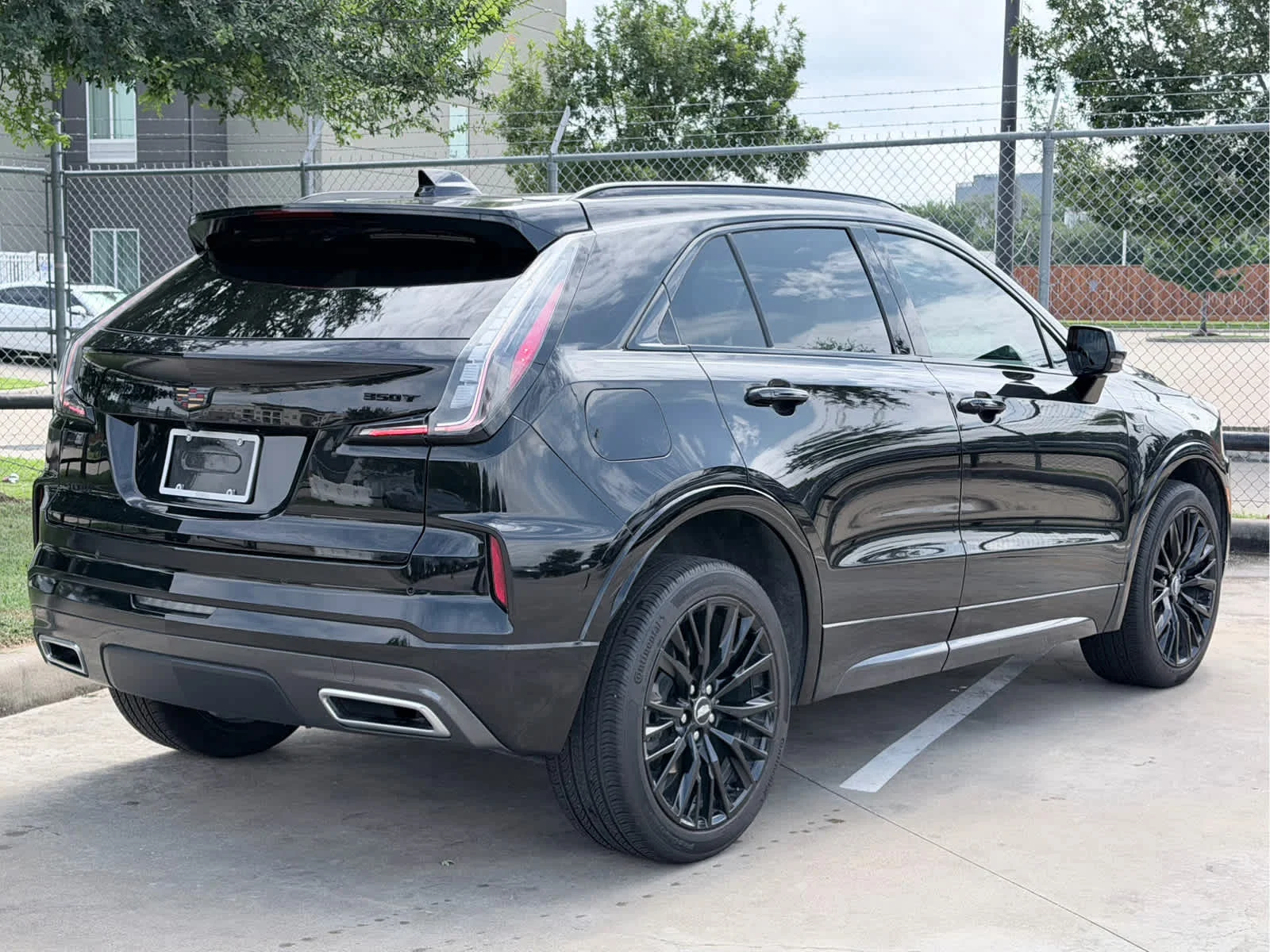 Used 2024 Stellar Black Metallic Cadillac Sport image 4