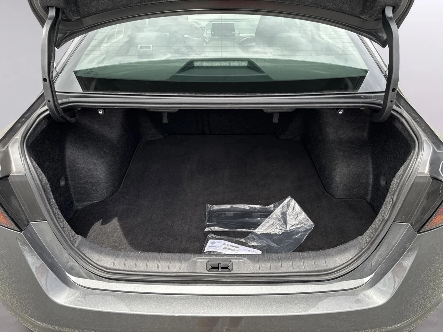 Used 2025 Gun Metallic Nissan SV image 32