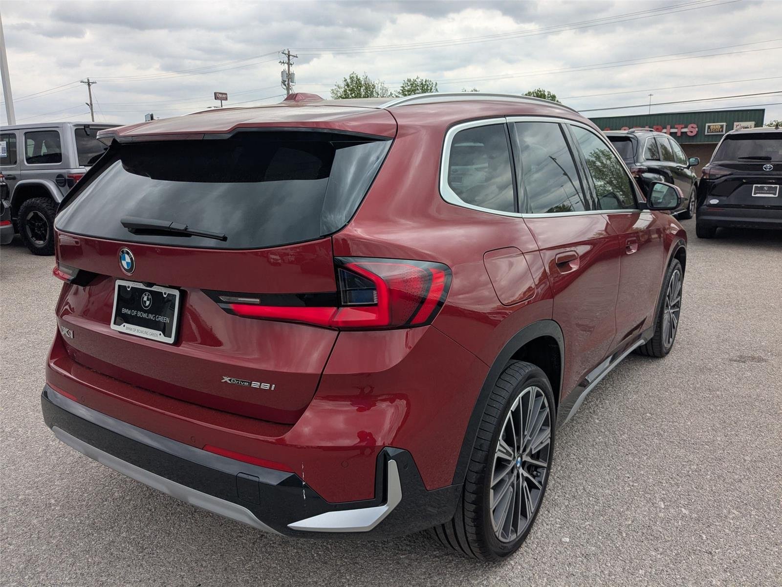 New 2026 Vegas Red Metallic BMW xDrive28i image 5