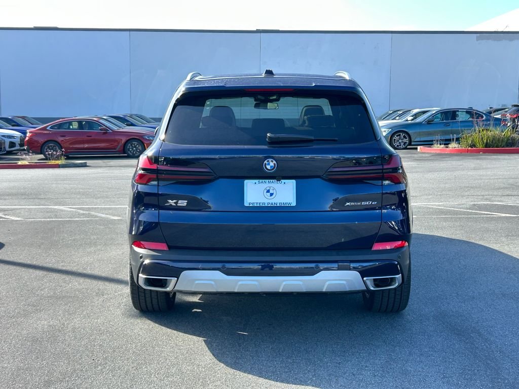 New 2026 Tanzanite Blue II Metallic BMW xDrive50e image 4