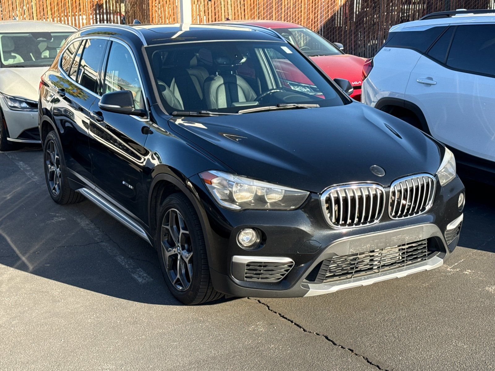 Used 2018 BMW X1 28i with VIN WBXHU7C34J5L05059 for sale in Cathedral City, CA