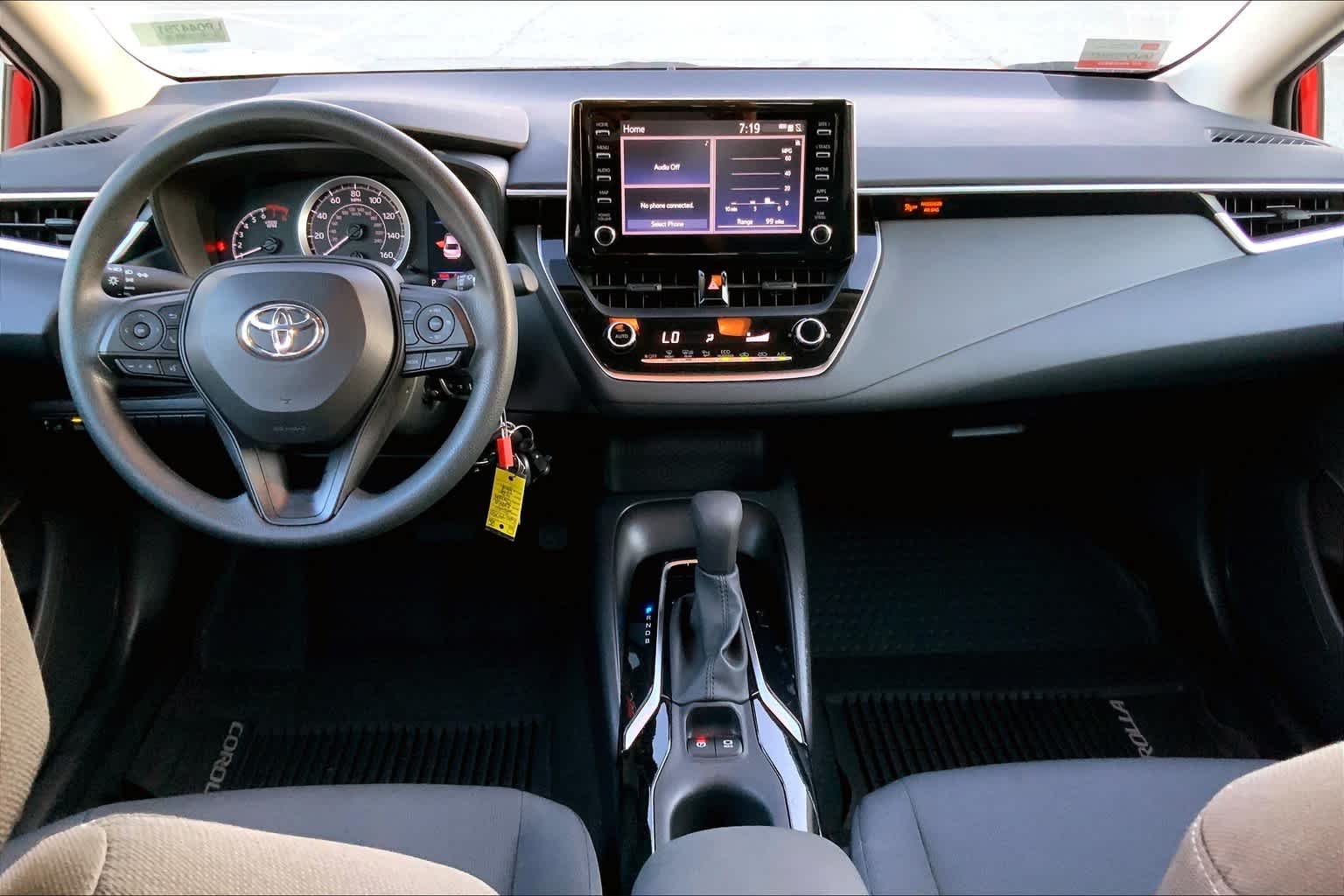 Used 2020 Barcelona Red Metallic Toyota LE image 16