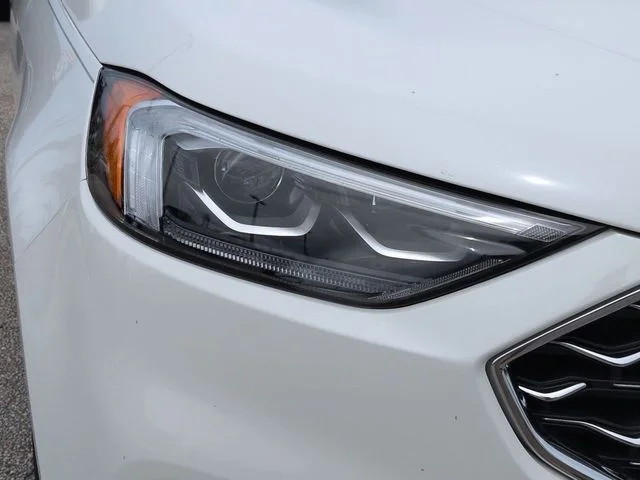 Used 2024 White Metallic Ford Titanium image 10