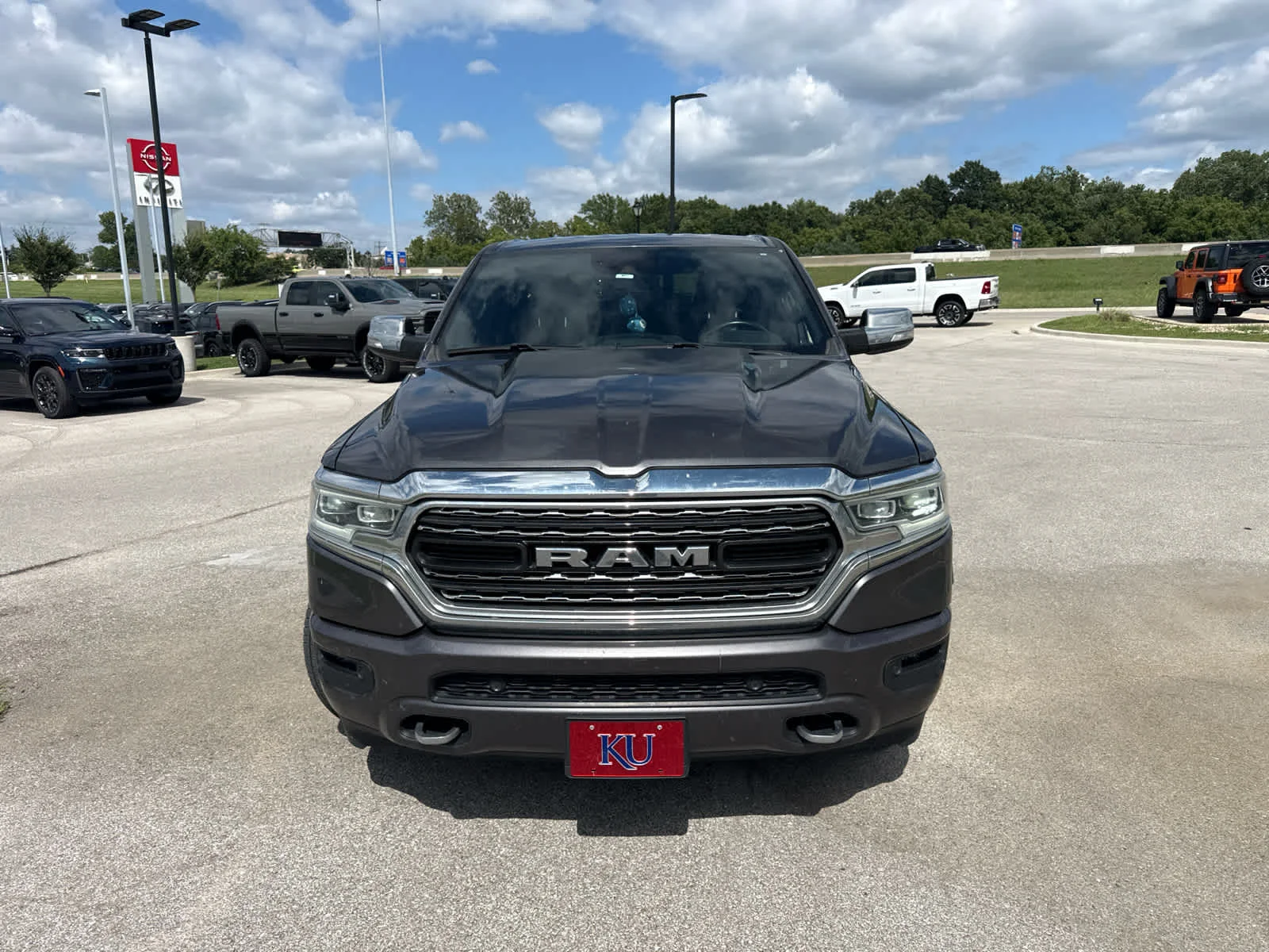 Used 2022 RAM Ram 1500 Pickup Limited with VIN 1C6SRFHT4NN447884 for sale in Kansas City