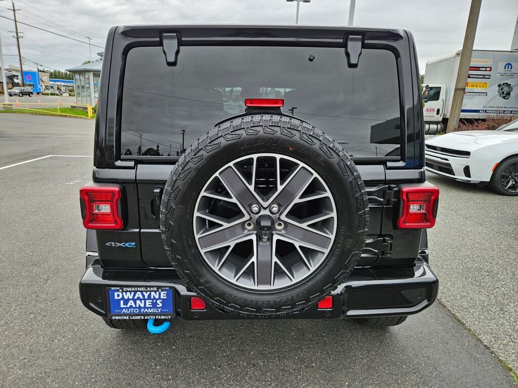 Used 2024 Black Clear Coat Jeep High Altitude 4xe image 4