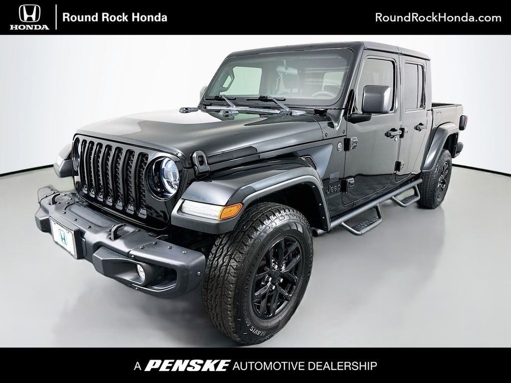 Used 2023 Black Clearcoat Jeep Sport image 1