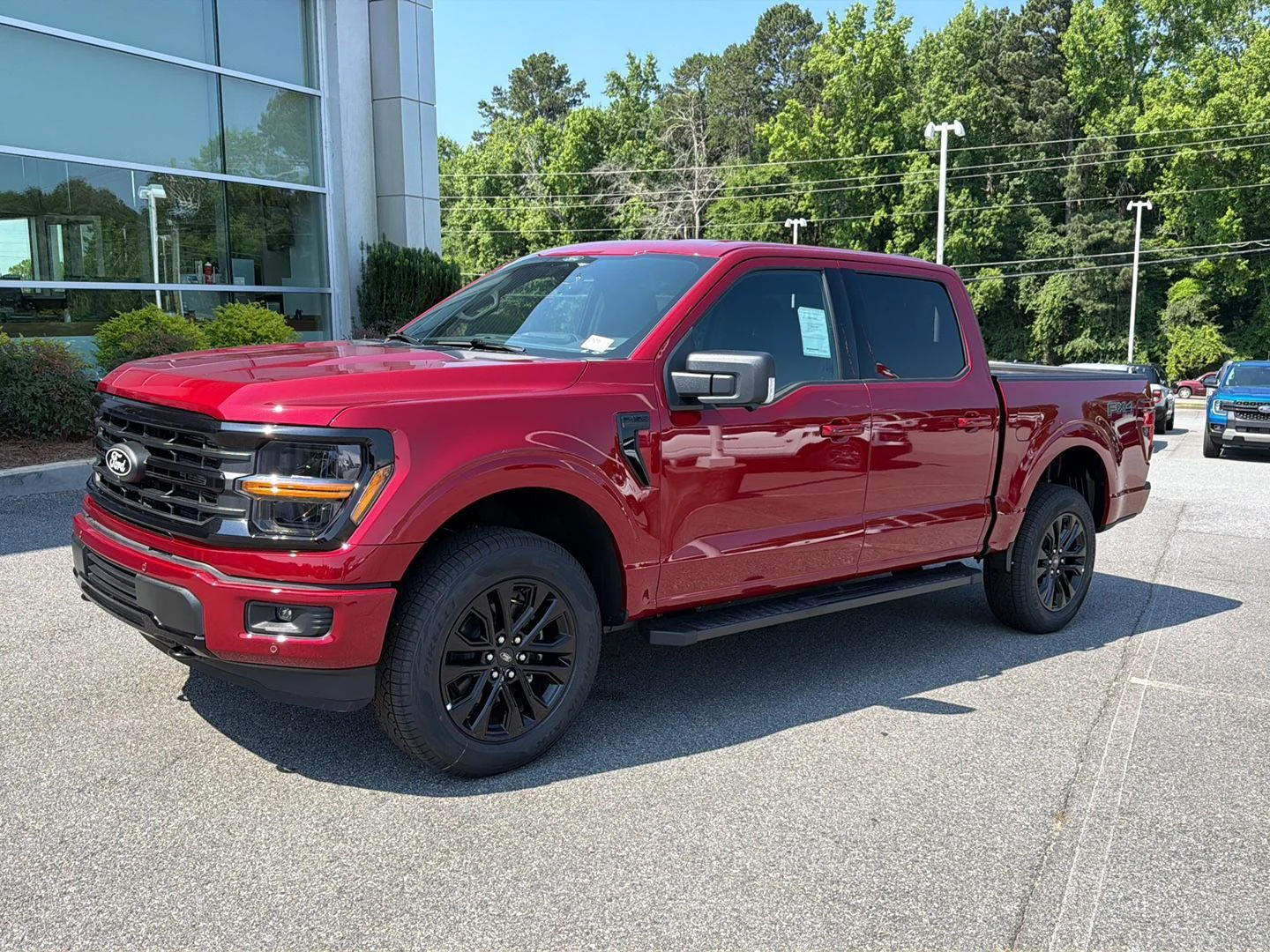 New 2026 Ruby Red Metallic Tinted Clearcoat Ford XLT image 1