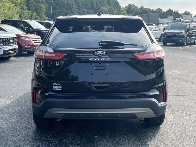 Certified Used 2021 Agate Black Metallic Ford SEL image 5