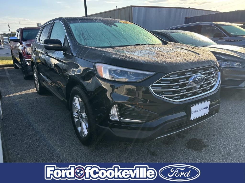 Certified Used 2020 Black Ford Titanium image 1